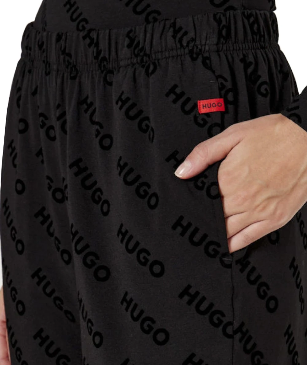 HUGO Women's Tracksuit Bottoms With All Over Logo. 4